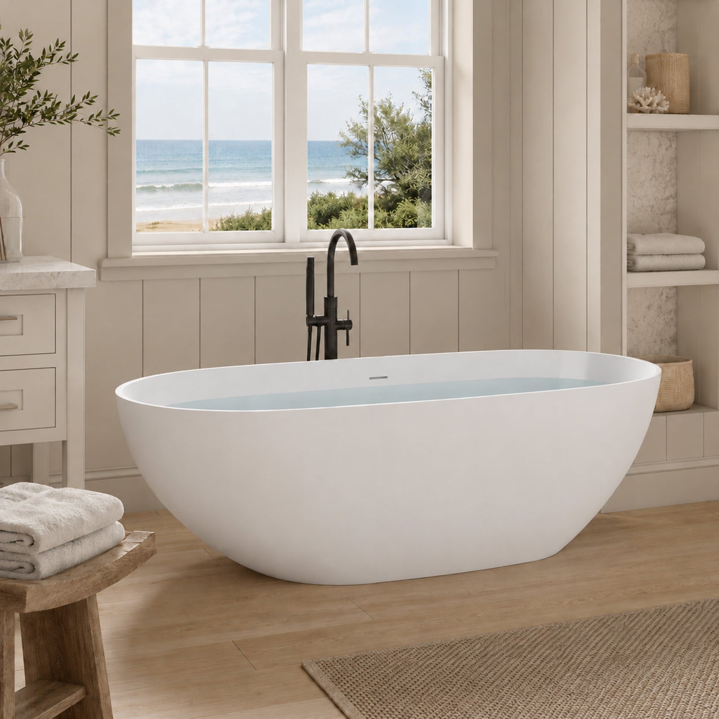Makot 5.6 ft. Man-Made Stone Center Drain Freestanding Bathtub in Matte White